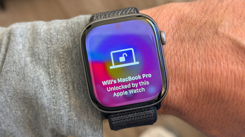Apple Watch with the text, "Will's MacBook Pro Unlocked by this Apple Watch"