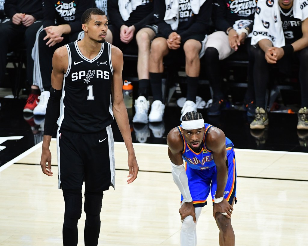 Victor Wembanyama of the San Antonio Spurs and Shai Gilgeous-Alexander of the Oklahoma City Thunder on the court.