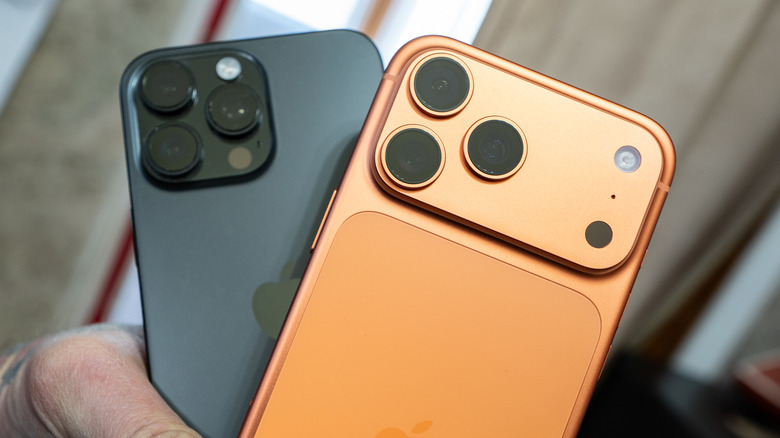 The iPhone 16 Pro Max behind the iPhone 17 Pro Max with a focus on the latter's new aluminium camera module.