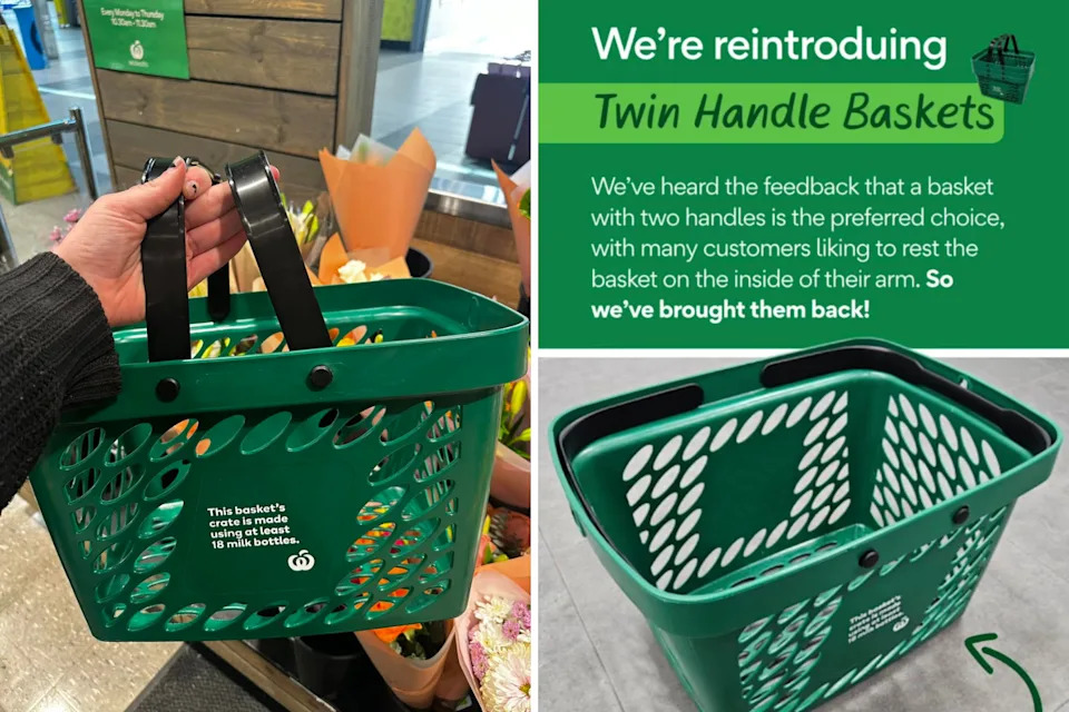 A person holding a shopping basket with two handles.