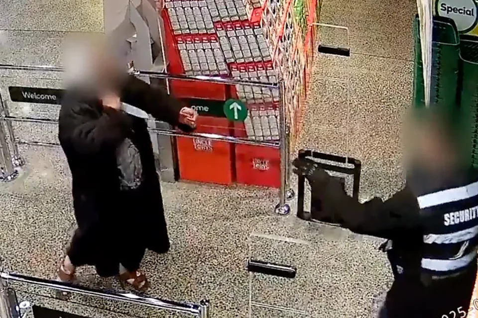 A Woolworths security officer targeted by a knife-wielding individual. 