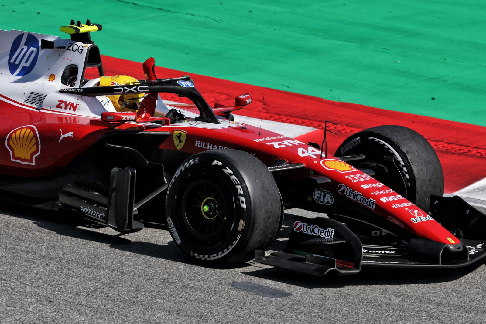 Hamilton celebrates his first win as a Ferrari driver 
