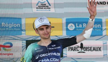 Decathlon CMA CGM Team's French rider Paul Seixas celebrates on the podium with the most combative rider award after the 7th stage of the Tour Auvergne-Rhone-Alpes cycling race (formerly known as the Criterium du Dauphine), 133,6km between La Bridoire and Grand Colombier in the French Alps on June 13, 2026. (Photo by Anne-Christine POUJOULAT / AFP)