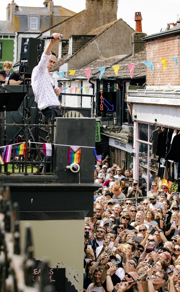 Handout photo issued by Outside Organisation of Nick Cave And The Bad Seeds playing a surprise gig on the roof of Resident Records in Brighton on Friday. Issue date: Friday July 31, 2026. PA Photo. Photo credit should read: Outside Organisation/PA Wire NOTE TO EDITORS: This handout photo may only be
