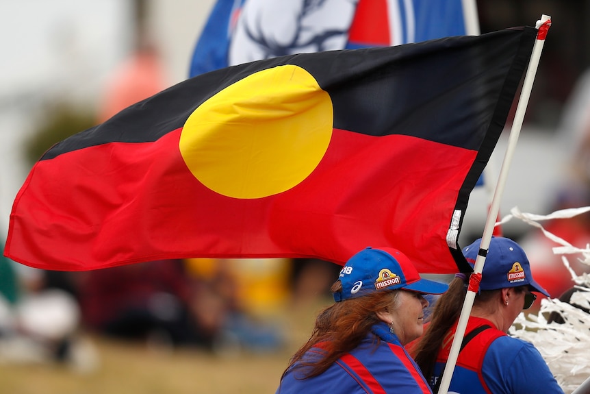 The Aboriginal flag is seen during the 2021 AFLW Round 05 match 2021.