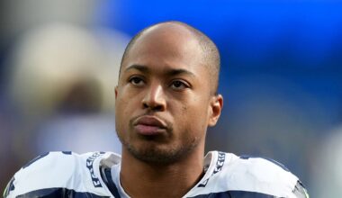 Former Seattle Seahawks wide receiver Tyler Lockett looks on