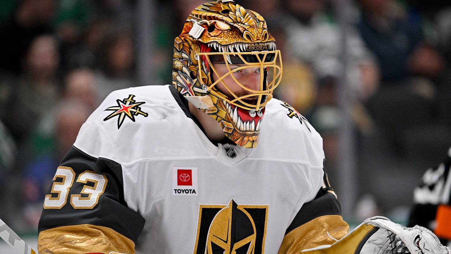 Mar 10, 2026; Dallas, Texas, USA; Vegas Golden Knights goaltender Adin Hill (33) faces the Dallas Stars attack during the second period at the American Airlines Center. Mandatory Credit: Jerome Miron-Imagn Images