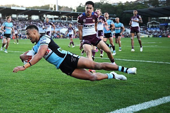 Ronaldo Mulitalo scores for the Sharks on Monday.