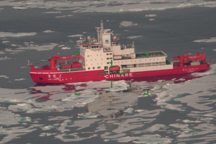 Icebreaker ship pictured among sea ice.