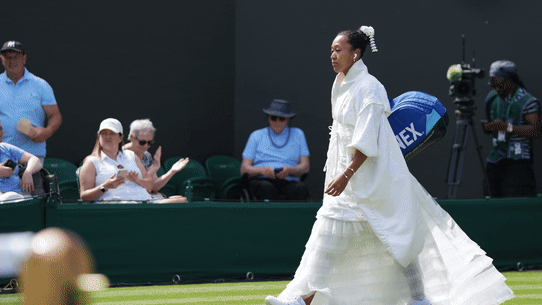 Naomi Osaka made another spectacular entrance for her first-round match at Wimbledon.