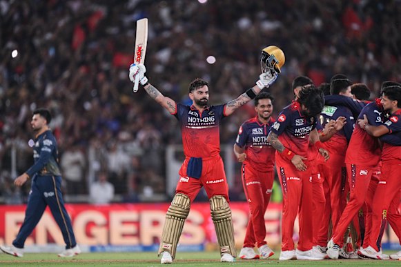 Virat Kohli celebrates after Royal Challengers Bangalore win the IPL final.