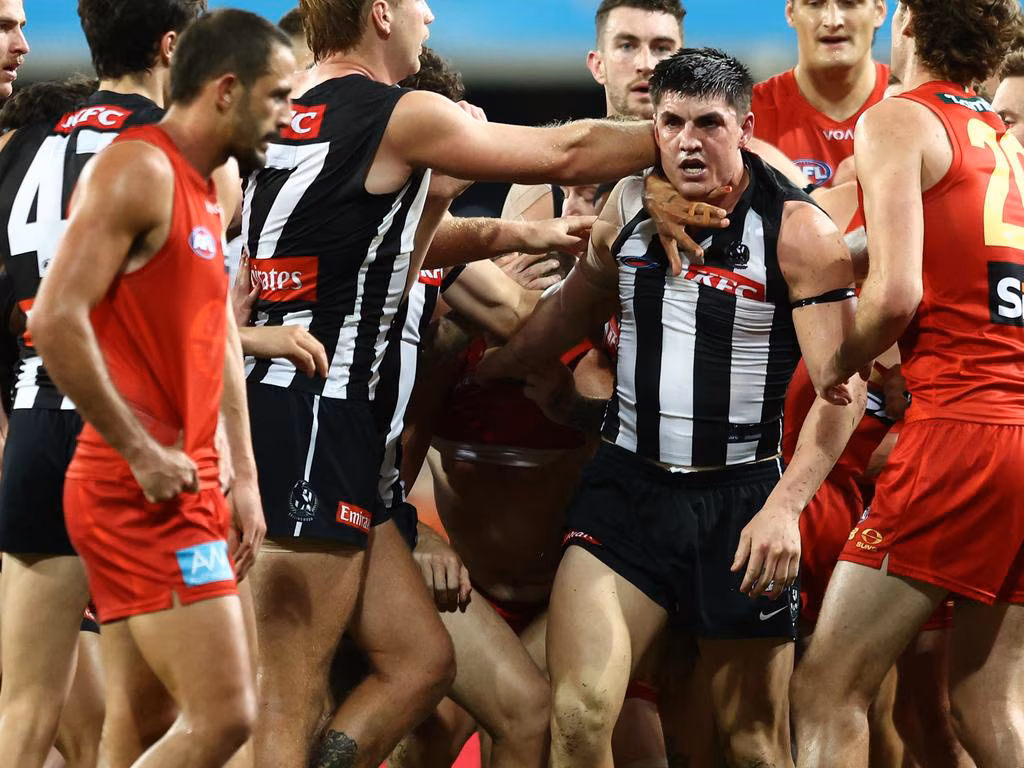 Watch: Maynard facing ban as Pies down Suns in fiery clash - Herald Sun
