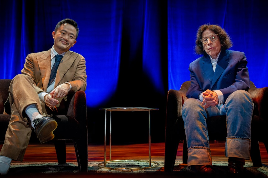 A man and a woman on stage.