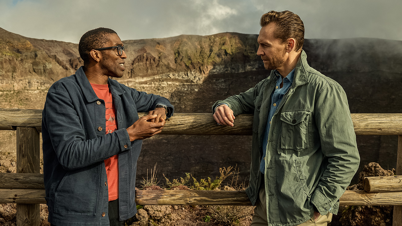 Professor Chris Jackson and Tom Hiddleston discuss the events at Pompeii from atop Mt. Vesuvius.
