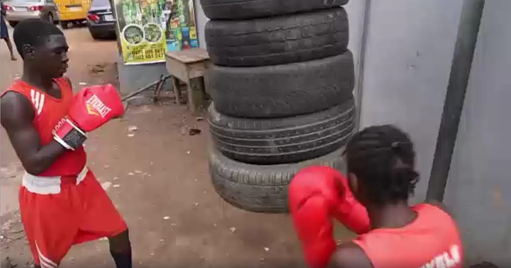 Nigerian youngsters learning boxing on the streets of Lagos