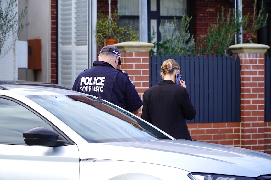 Forensic officers are investigating at the crime scene