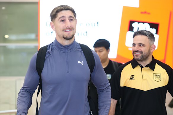 Zac Lomax touches down in Sydney on Monday night with PNG Chiefs’ football manager Michael Chammas.