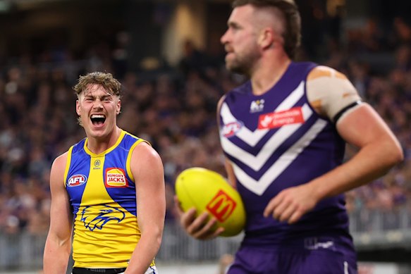 Harley Reid of the Eagles reacts after giving away a free kick to Luke Ryan of the Dockers.