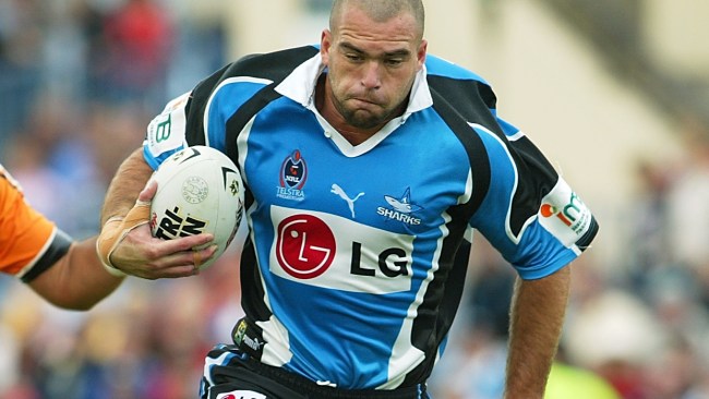 NRL community mourns death of Karl Lovell, former Parramatta Eels and Cronulla Sharks player, after battle with lung cancer
