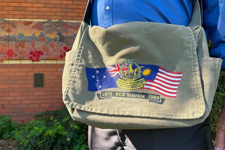 Man's bag with RCB logo