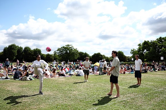 Wimbledon queuers find all sorts of ways to pass the time.