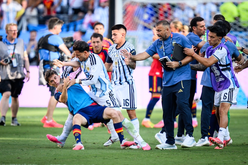 Leandro Paredes fights Gavi as others nearby watch on