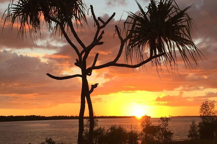 Sunset over a beach at Aurukun in Far North Queensland