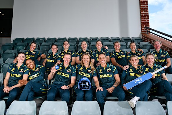 Australia pose with Prime merchandise for a photo ahead of the T20 World Cup in England in June.