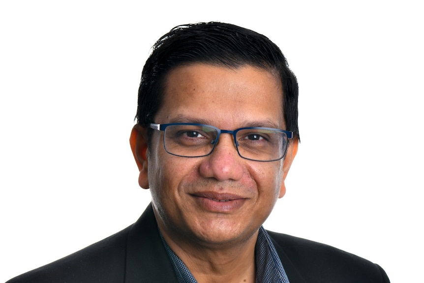 man in suit and glasses