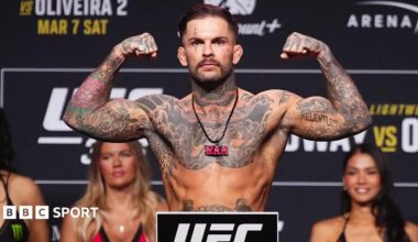 Cody Garbrandt is shirtless and holding up his arms