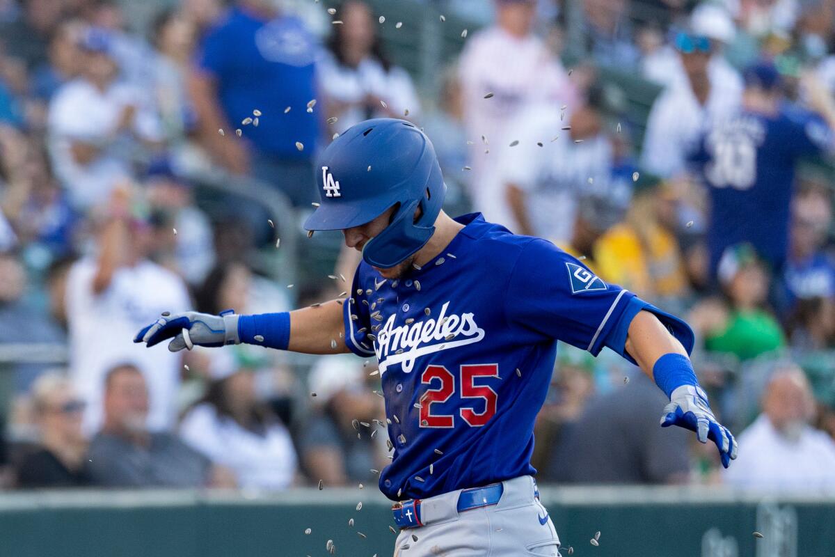 Tommy Edman celebrates after hitting a three-run homer in the third inning Tuesday.