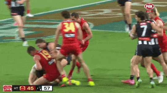 The melee on the Gold Coast involving Suns and Magpies players after Ben Long’s bump on Brayden Maynard.