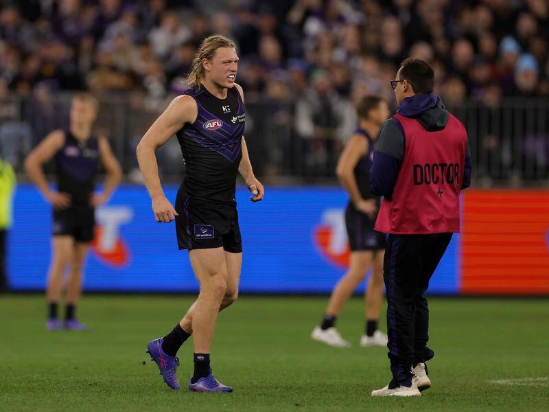 Hayden Young is doubtful to play against the Sydney Swans but his return is not far away. Photo: Richard Wainwright/AAP PHOTOS