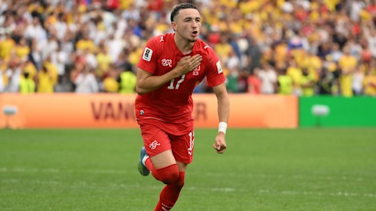 Ruben Vargas #17 of Switzerland celebrates after scoring the winning penalty.