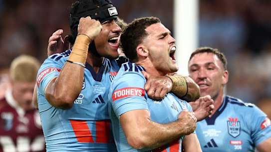Nathan Cleary celebrates his try for NSW.