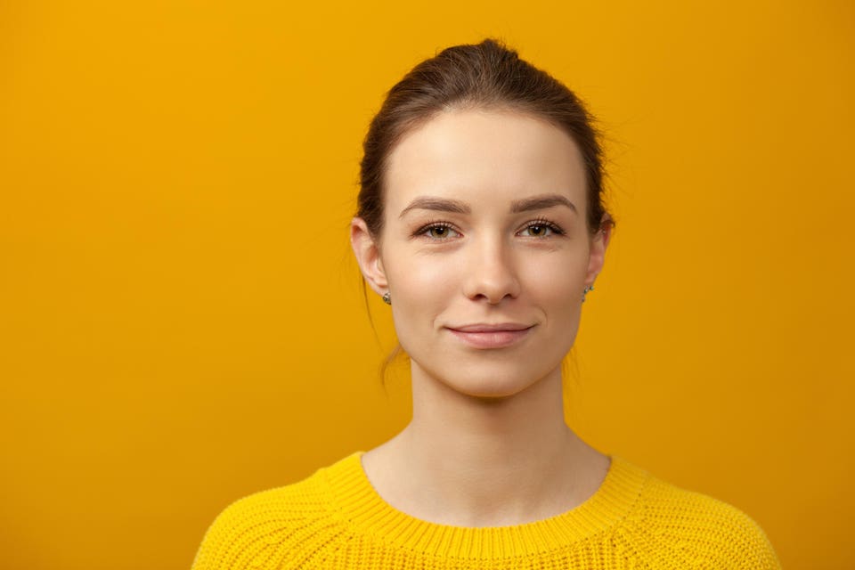 An attractive young woman thinking about AI and its impact on her career