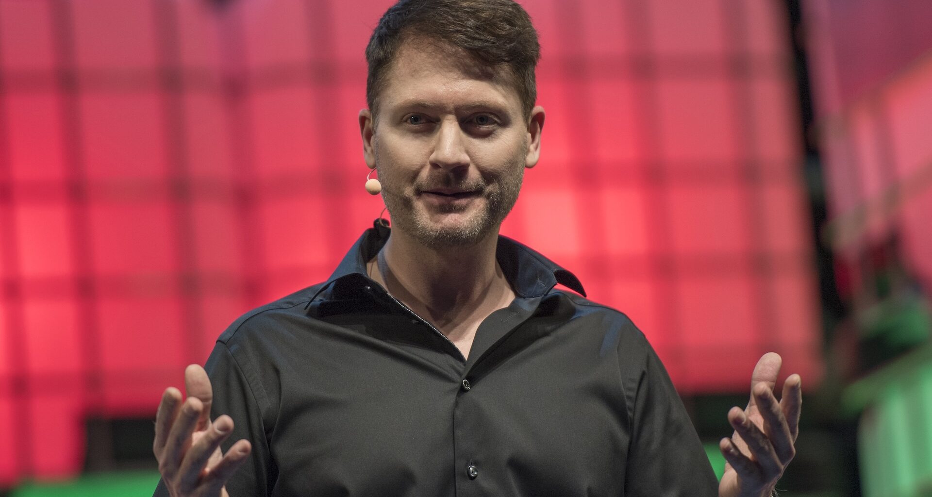 Tech entrepreneur Bryan Johnson speaking at an event.
