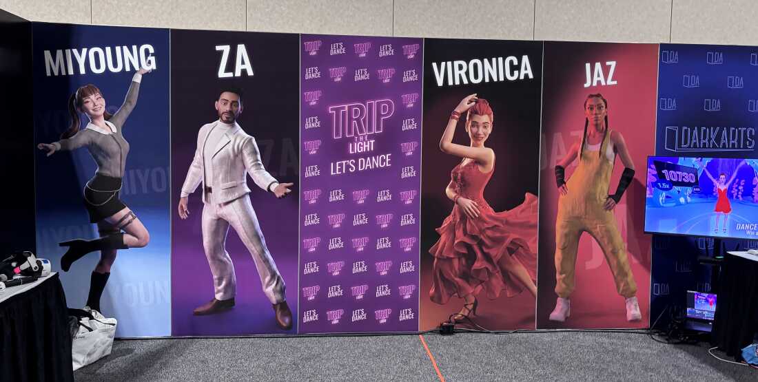 Trip the Light's booth at the Augmented World Expo included posters of the app's virtual instructors. Real-life performers, who gave Trip the Light permission to motion capture their movements, were used as a basis for these avatars.