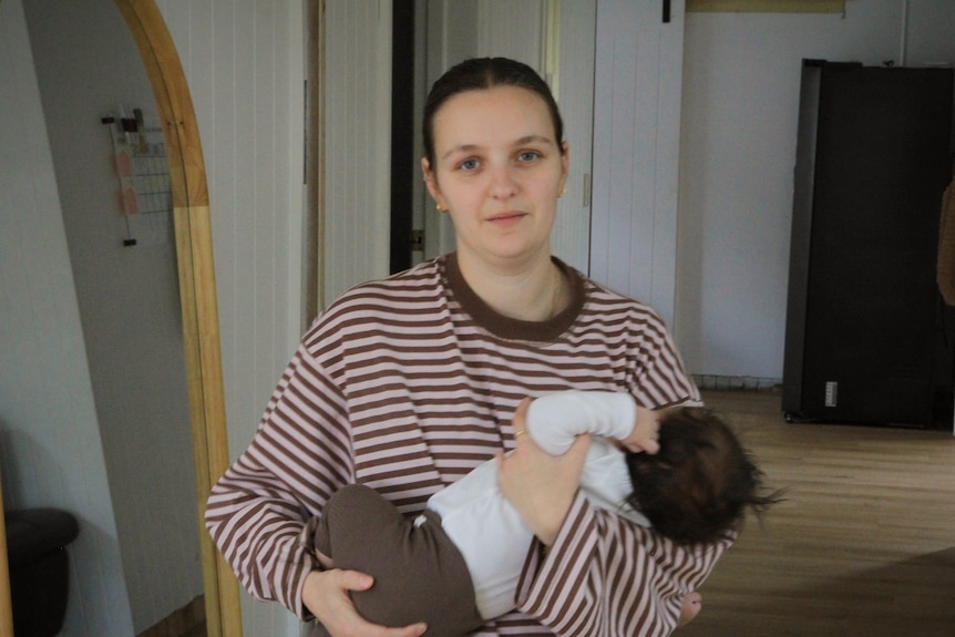 woman holding baby