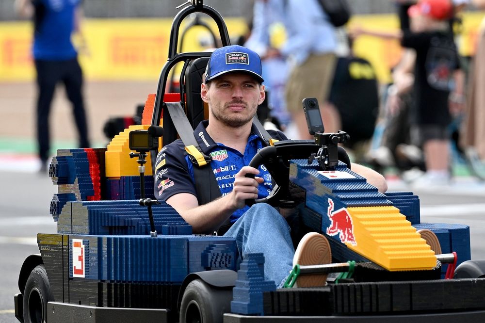 Verstappen looks unimpressed with the idea of having to drive a brick...