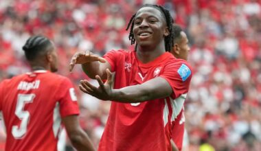 Johan Manzambi celebrates Switzerland's second goal which handed them victory over Canada