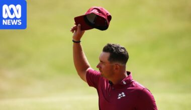 Australia's Lucas Herbert equals lowest round in men's major golf history as he takes halfway lead at British Open