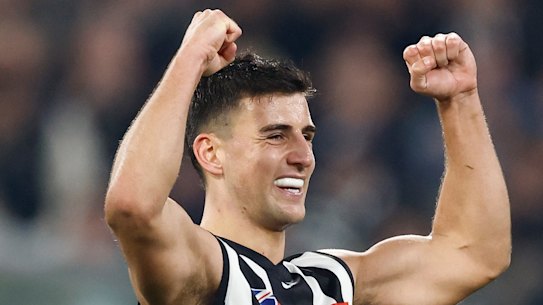 Nick Daicos of the Magpies celebrates.