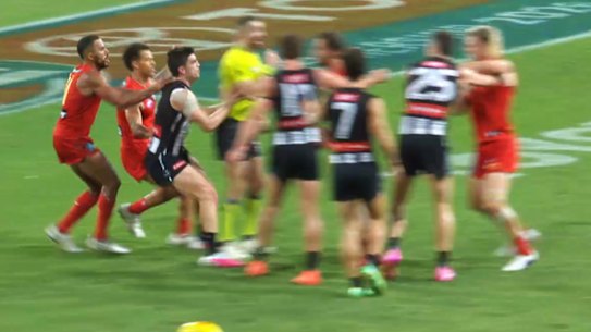 A melee erupted between the Suns and Magpies players at half-time on Saturday night.