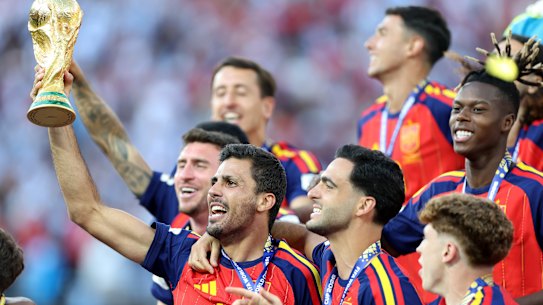 Spain captain Rodri celebrates winning the World Cup.