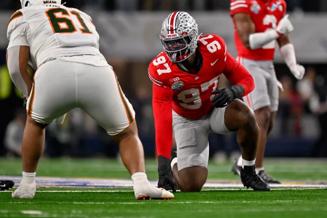 Dec 31, 2025; Arlington, TX, USA; Ohio State Buckeyes defensive end Kenyatta Jackson Jr. (97) gets into position during the 2025 Cotton Bowl and quarterfinal game of the College Football Playoff at AT & T Stadium. Mandatory Credit: Jerome Miron-Imagn Images