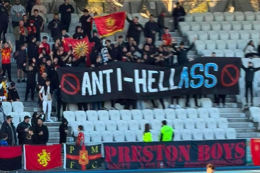 Supporters of the Preston Lions hold up a banner reading "Anti-Hellass".