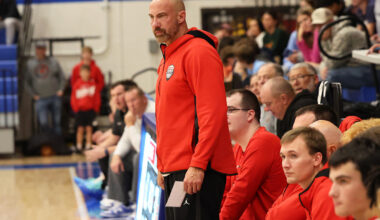 Staunton coach Ty Laux stands in front of his team's bench during a Nov. 26 game vs. Jersey at the Roxana Hoopsgiving Classic. Laux is the 2026 Telegraph Small-Schools Boys Basketball Coach of the Year.