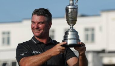 IT'S MINE: Ryan Fox was reluctant to share the trophy with his daughters on his return home. Photo: EPA PHOTO