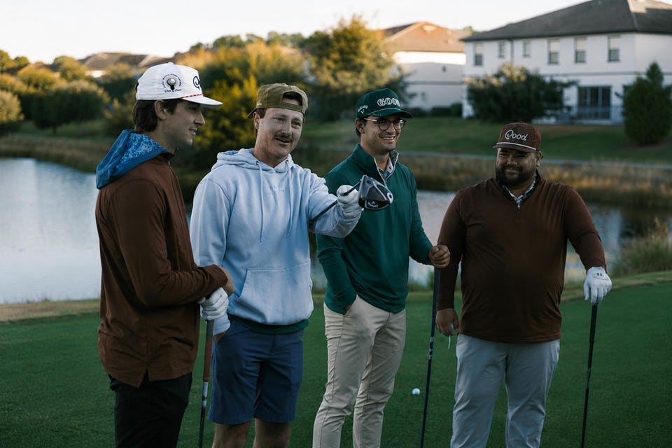 Members of Good Good on a golf course